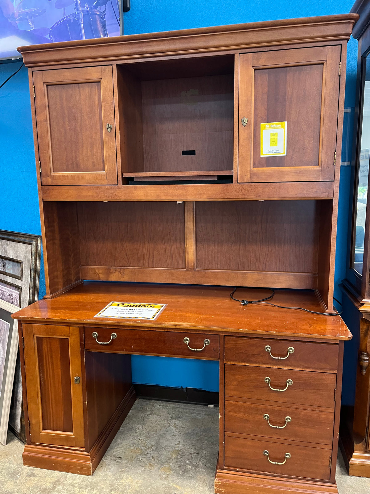solid redish desk with storage top