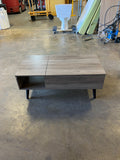 gray wood coffe table with inside storage